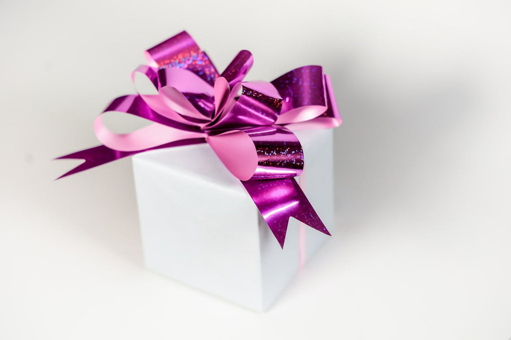 LIGHT PINK HOLOGRAM BUTTERFLY PULL BOW